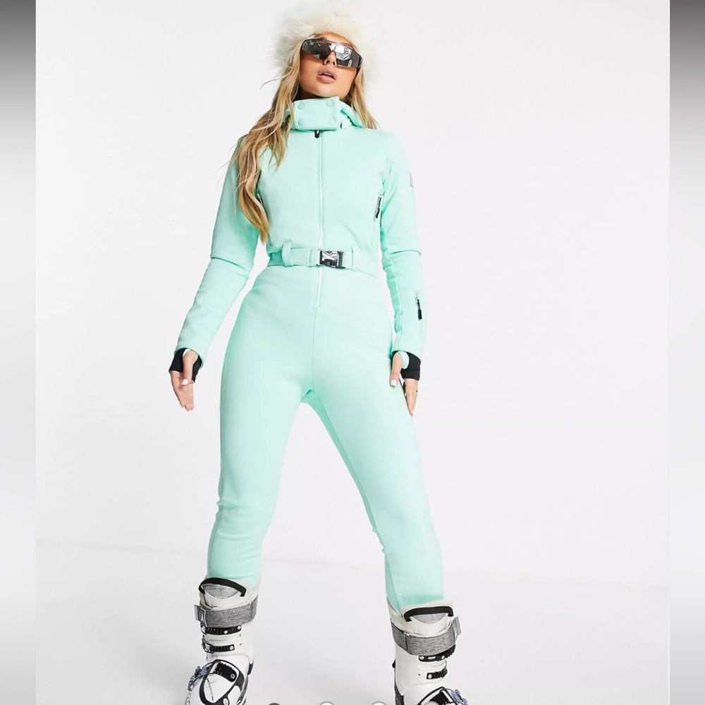 NOT FOR SALE - Turquoise apres ski suit, can be worn for spring skiing.